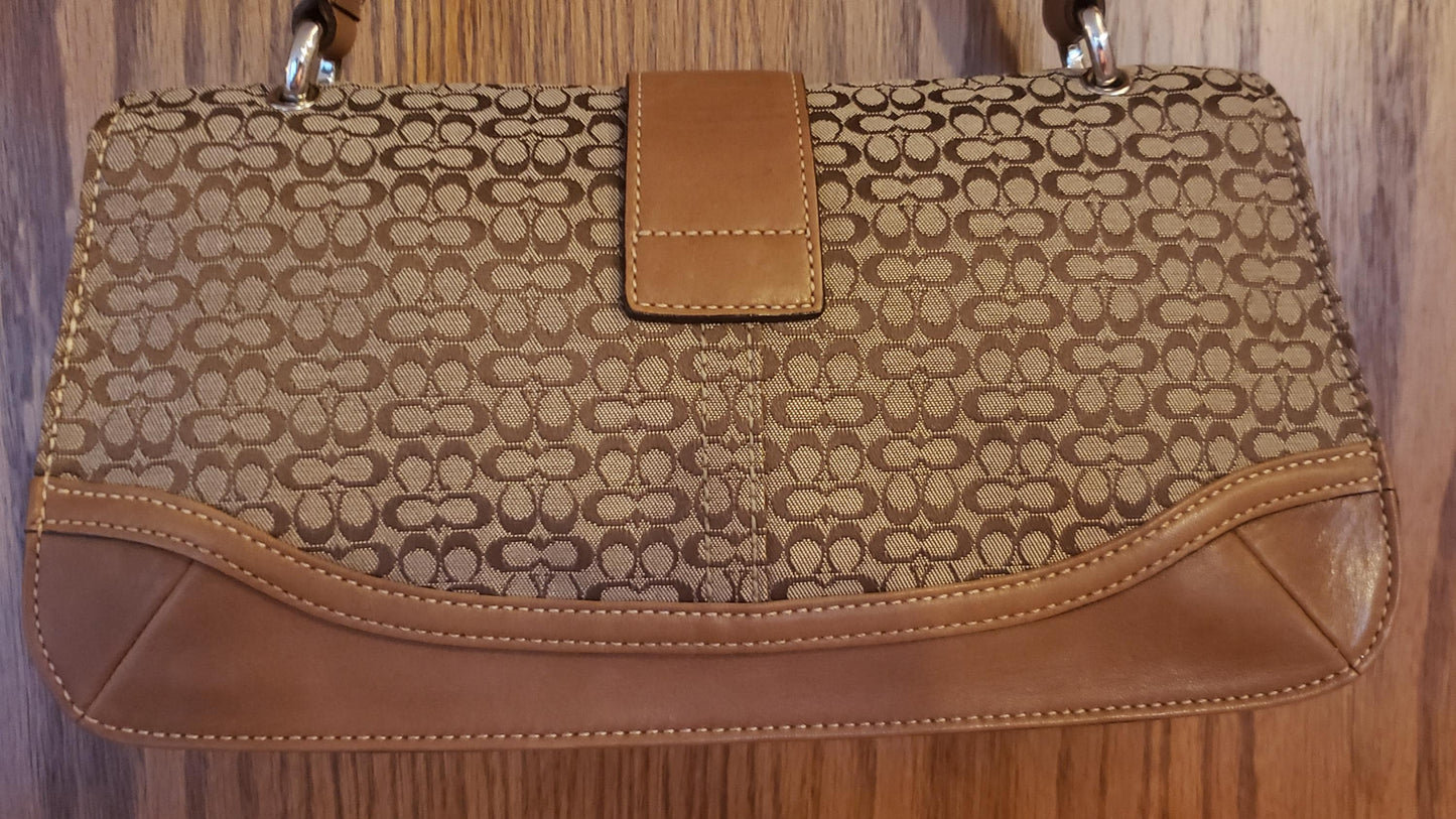 Vintage COACH iconic Soho Optic Signature Canvas and leather shoulder buckle flap bag #7075 Y2K