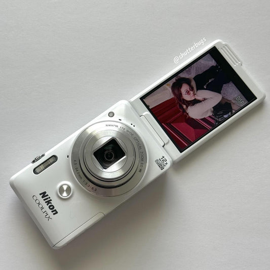 Pre-Owend NK Coolpix S6900 Digital Camera Bundle RARE